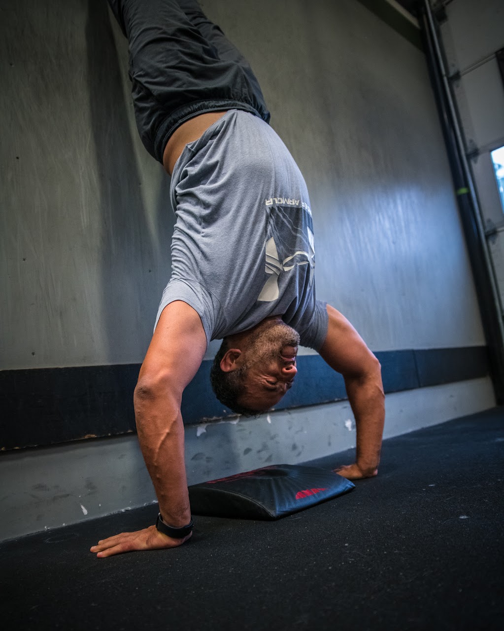 Lifting Deadlifts and Hollow Rocks & AMRAP 12 mins Handstand Pushups